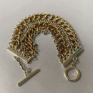 Beautiful multi chain gold and silvertone Aigner bracelet